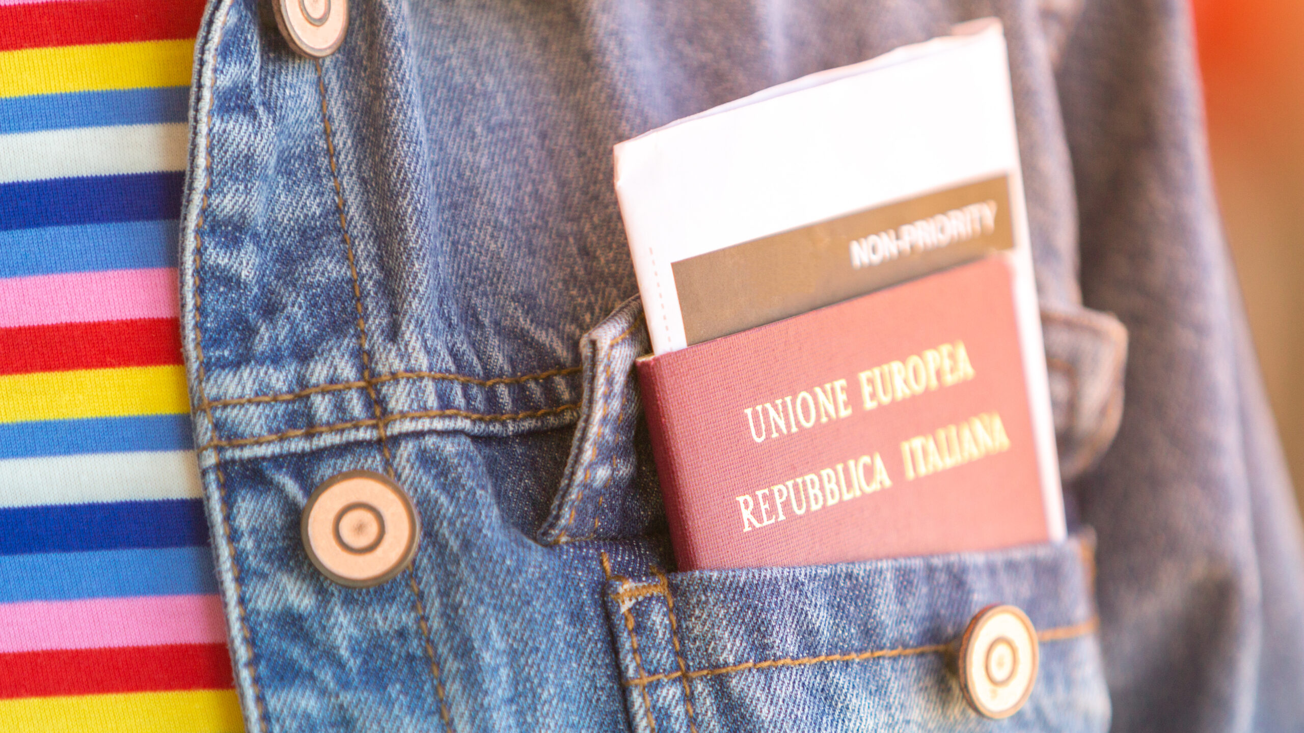 Italian,Passport,And,Boarding,Pass,In,The,Front,Pocket,Of